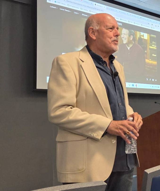 Tony Silvia speaking at a lecture in Dunedin, Florida